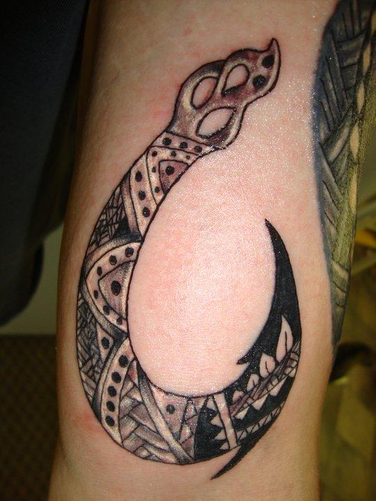 tribal fishing hook tattoo