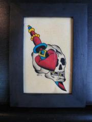 skull with dagger and heart