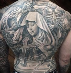 Full Back Tattoo Featuring Religious and Skeletal Imagery